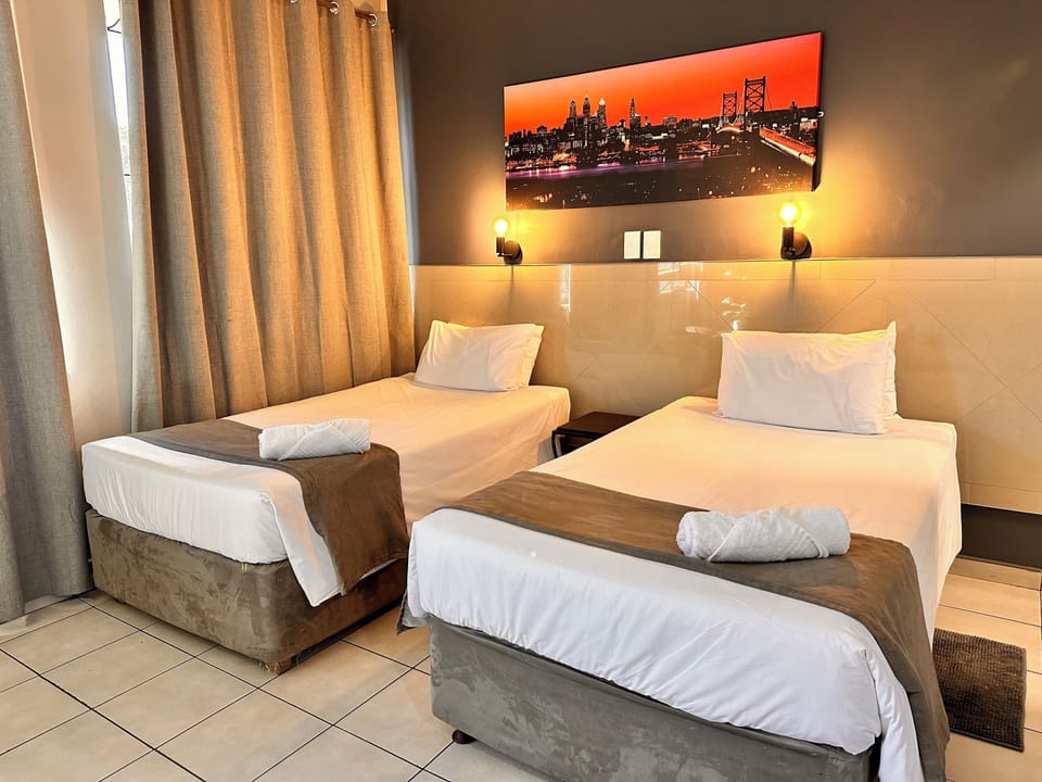 Standard Twin Room | 1 bedroom, blackout drapes, free WiFi, bed sheets