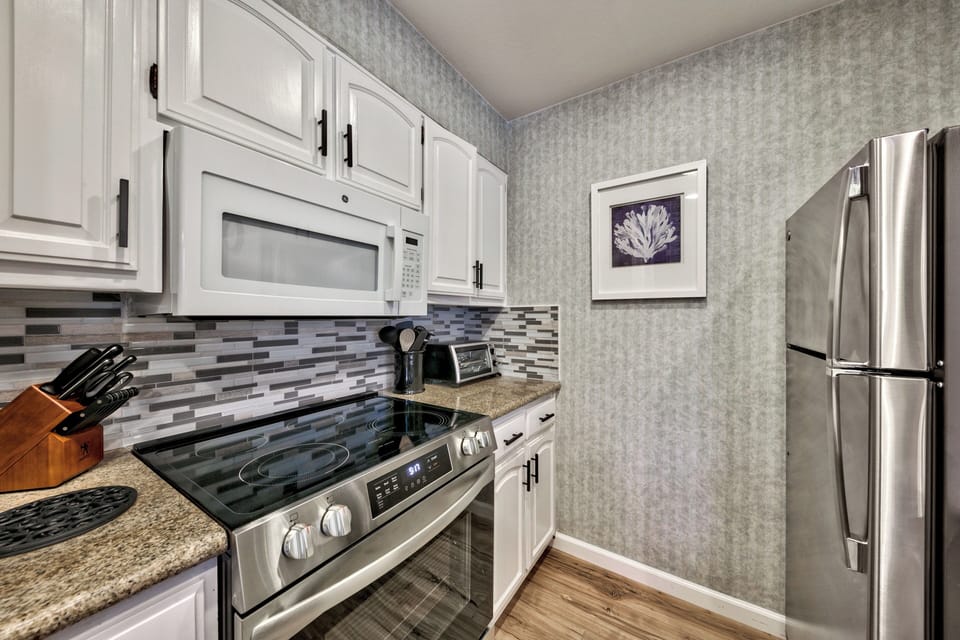 Your fully equipped kitchen features stainless steel appliances, granite countertops, and everything you need to prepare delicious meals during your stay.
