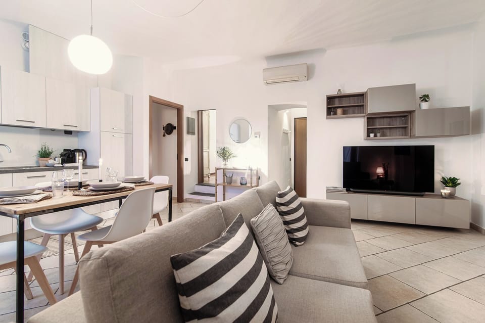 Apartment | Living area | 30-inch TV with digital channels