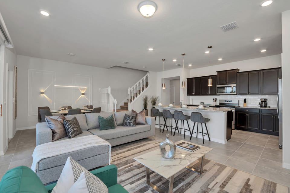 Charming townhouse in Davenport Florida - Plush and comfortable seating arrangements - Spacious open-plan design for a modern feel - Stylish, contemporary furnishings enhancing the aesthetic