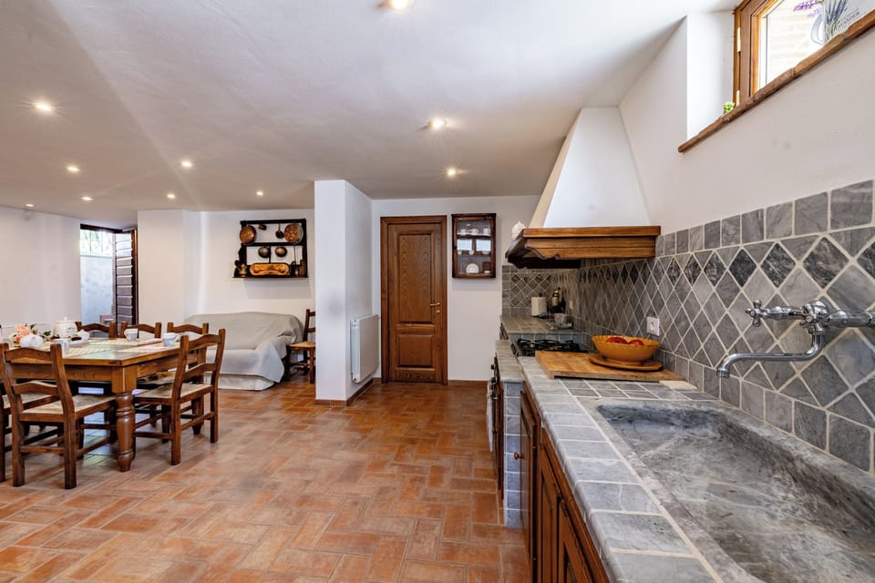 Family Villa, Multiple Bedrooms, Mountainside (Villa Vittoriano - Surrounded By) | Private kitchen | Fridge, microwave, oven, stovetop