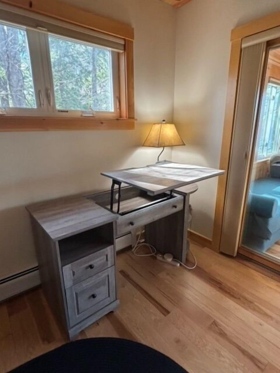 If you need to stand while working this desk has you covered