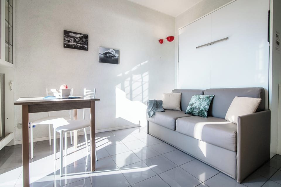 Apartment | Living area | 30-inch TV with cable channels