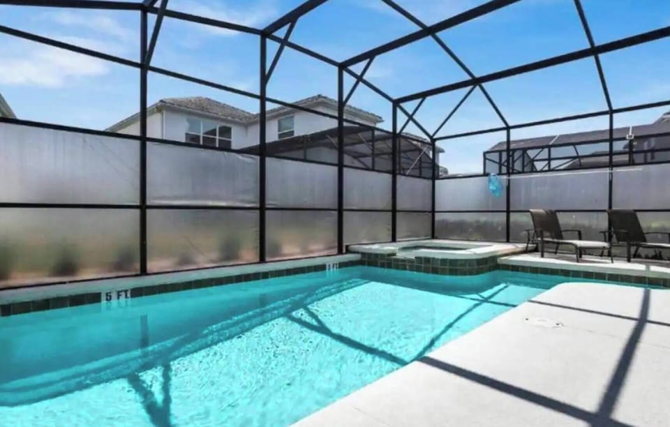 Relax in our private pool area, where sunlight sparkles on crystal-clear water. Enjoy the modern design, stylish hot tub, and comfy lounge chairs, ideal for sunbathing or delightful evenings under the stars.