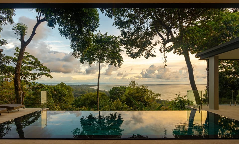 An infinity pool framed by the Pacific, designed for quiet moments and long views