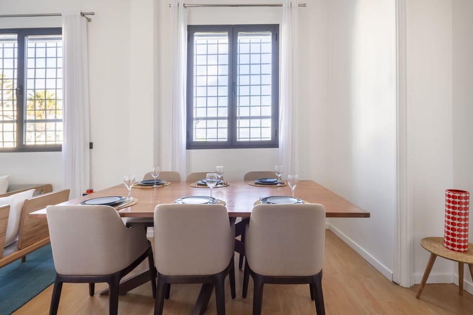 Elegant dining table for six with plush seating