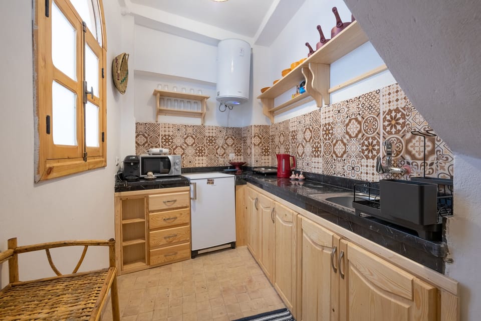 Kitchen: Prepare meals in a well-equipped kitchen