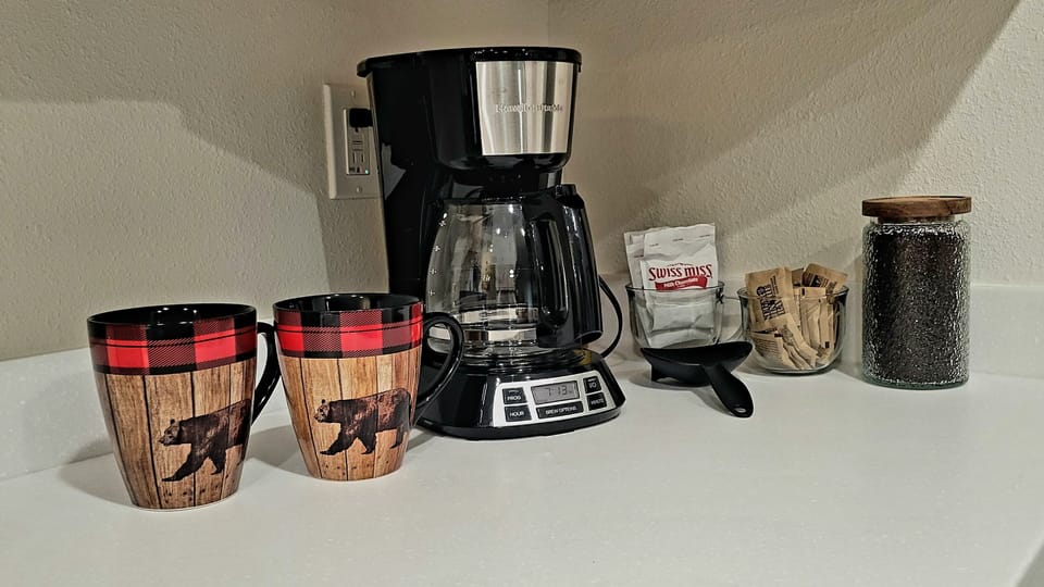 Coffee Station. Coffee, tea, hot chocolate and sugar to get you started.