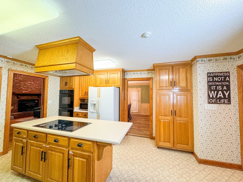 A double oven and large pantry makes this room a chef's favorite!