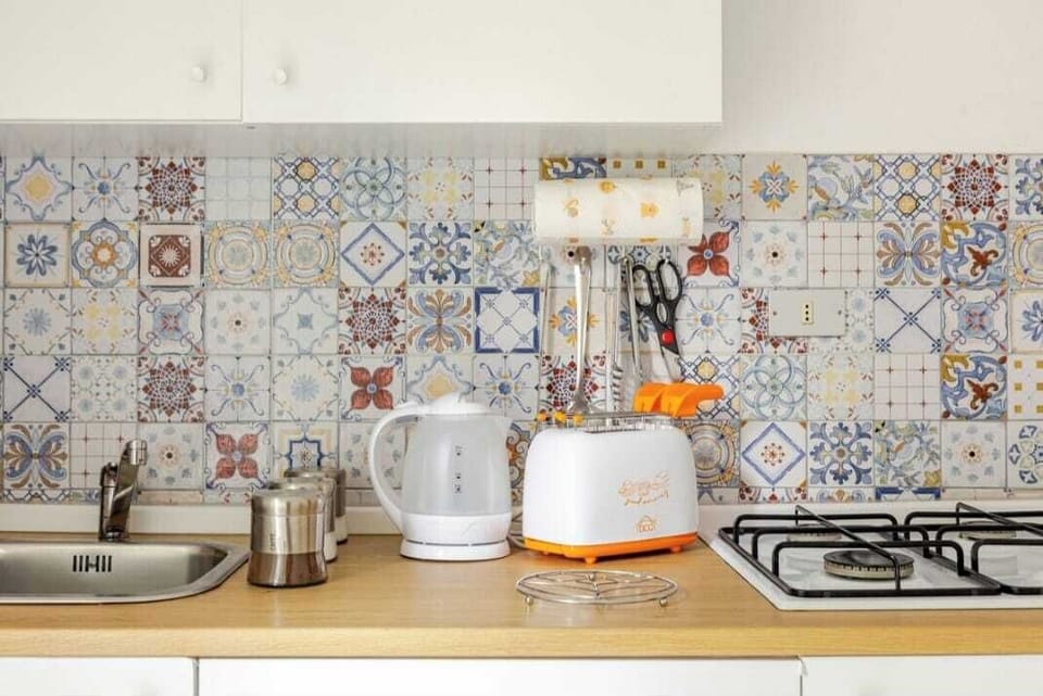 Family Apartment | Private kitchen | Electric kettle, highchair