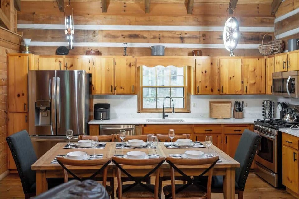 Welcome home! The kitchen, dining, and cozy seating area are all connected, making it easy to share a meal or conversation.