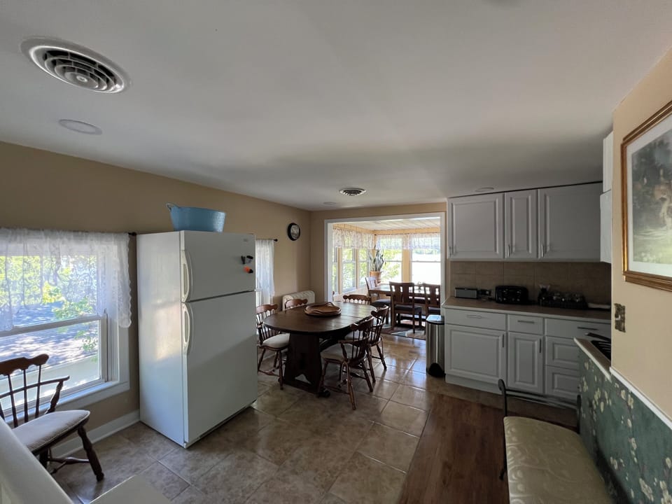 2nd floor kitchen dinning area with walk out to sunroom