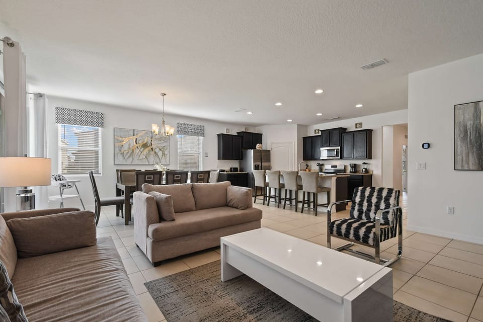 Experience comfort and convenience in our well-appointed living room, designed for your relaxation.