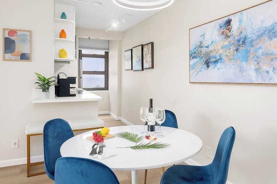 Dining table with 4 chairs for shared meals.