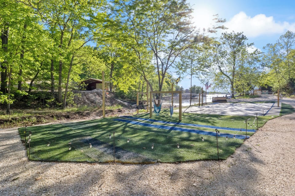 Sand volleyball surrounded by soft turf and seating will be a favorite for everyone!