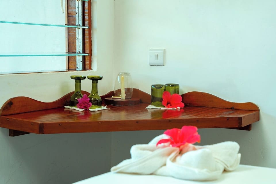 Deluxe Room, Ocean View | Minibar, in-room safe, individually decorated, individually furnished