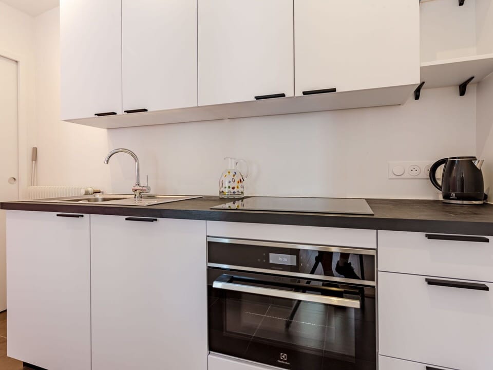 Cabinetry, Property, Countertop, Sink, Kitchen Sink, Building, Tap, Kitchen Stove, Kitchen, Kitchen Appliance