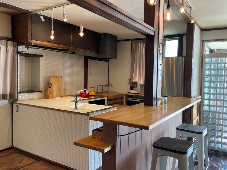 Western Style Double Room 204, Non Smoking | Shared kitchen | Full-size fridge, microwave, stovetop, rice cooker