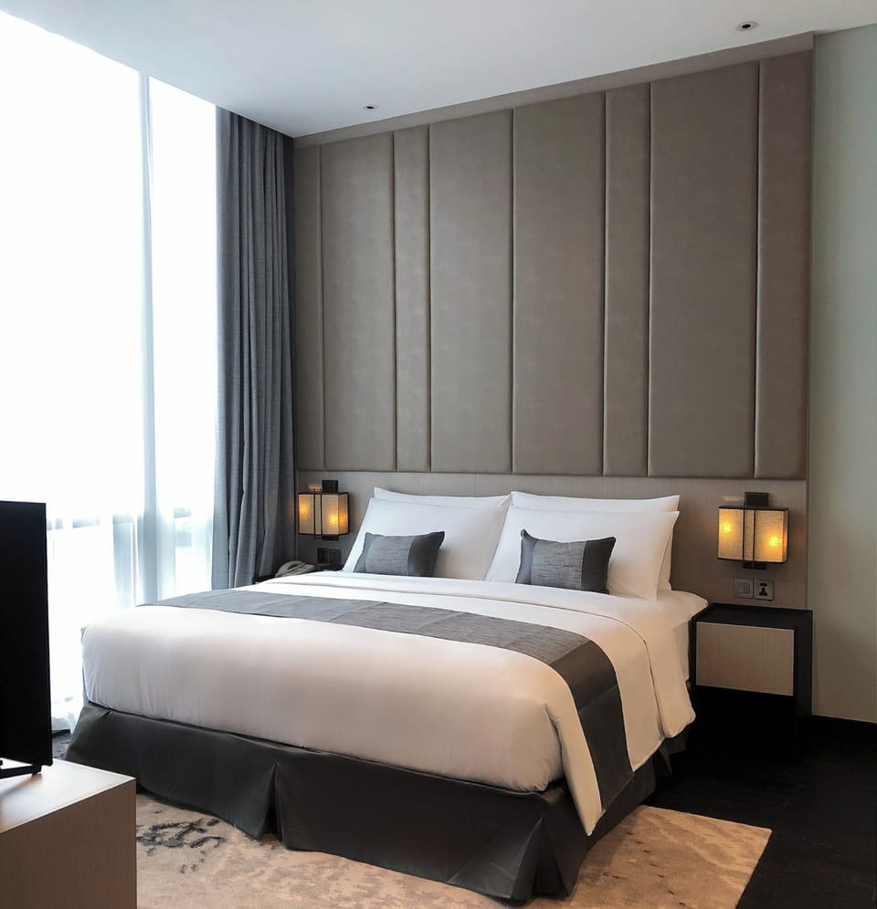 In-room safe, laptop workspace, blackout drapes, soundproofing
