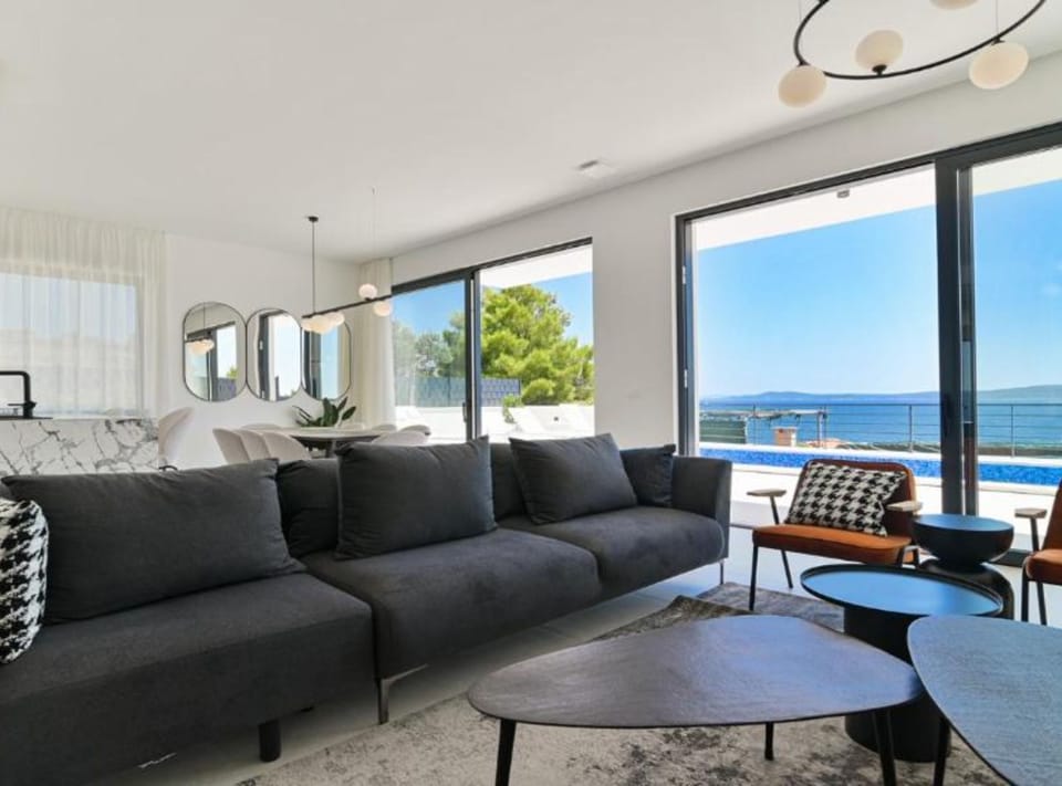 Villa (Five bedroom Villa with Terrace and S) | Living room | 32-inch flat-screen TV with digital channels