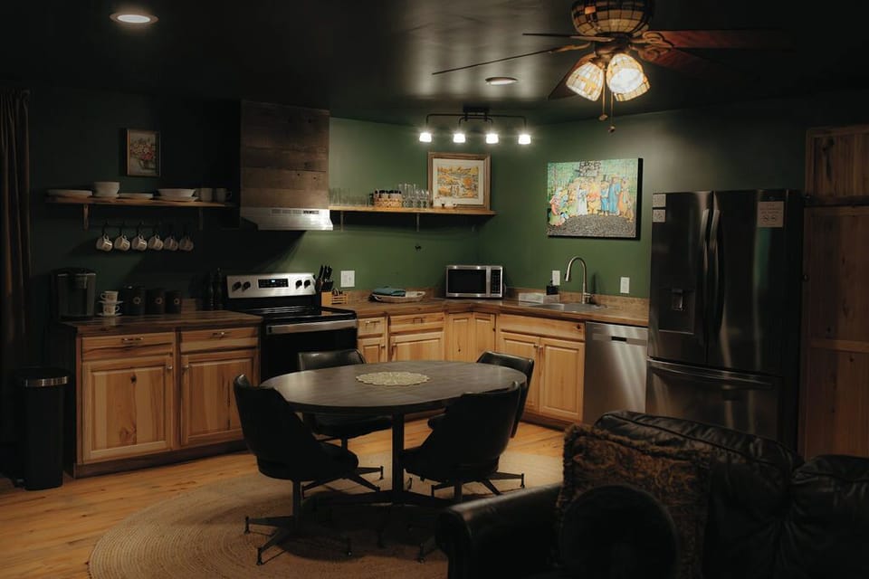 The kitchen comes with an electric stove, refrigerator, microwave and coffee. 