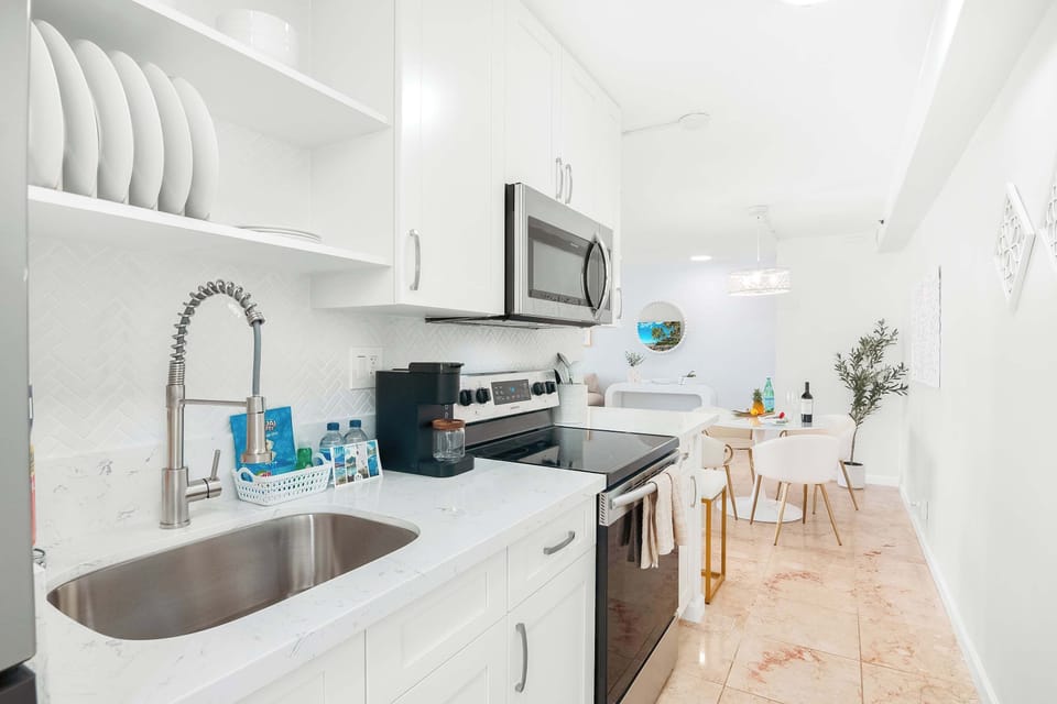 Fully equipped kitchen with full-size appliances.
