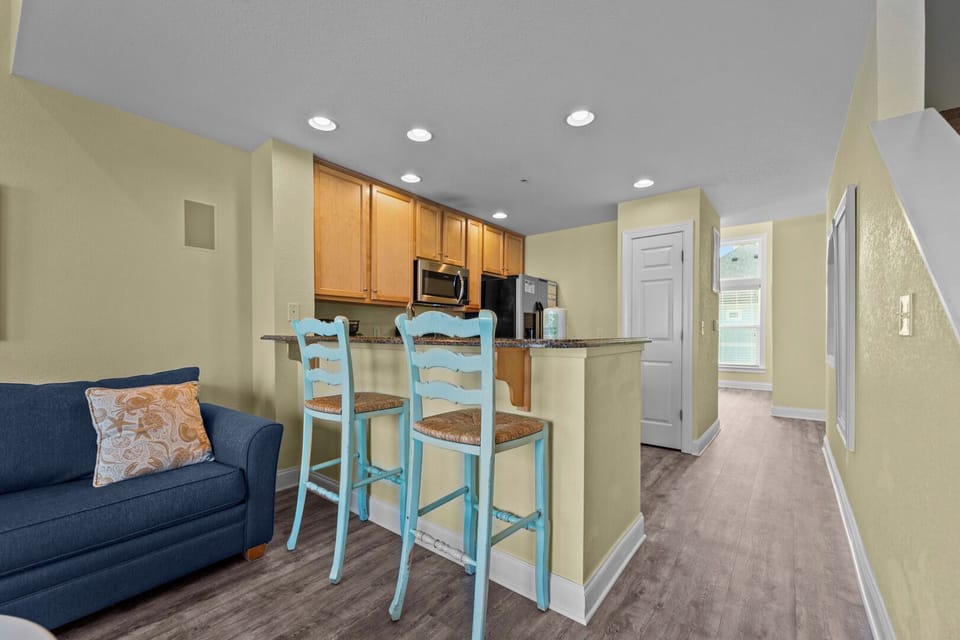 Kitchen Area with Two Bar Seats on Third Level