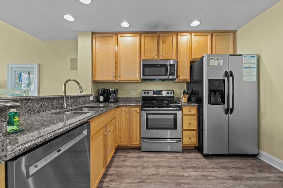 Kitchen Area with Two Bar Seats on Third Level