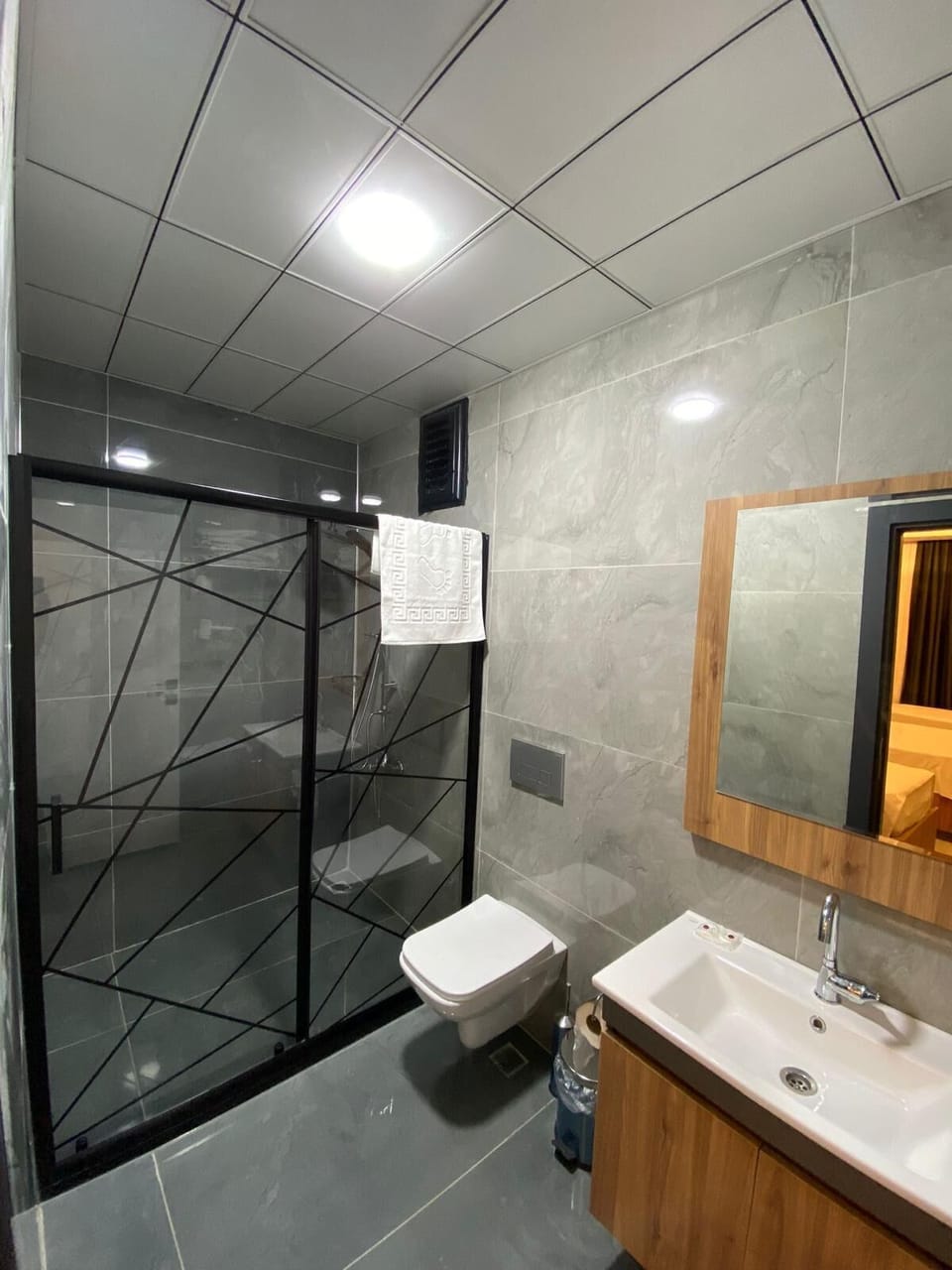Standard Quadruple Room, Multiple Beds | Bathroom | Shower, rainfall showerhead, free toiletries, slippers