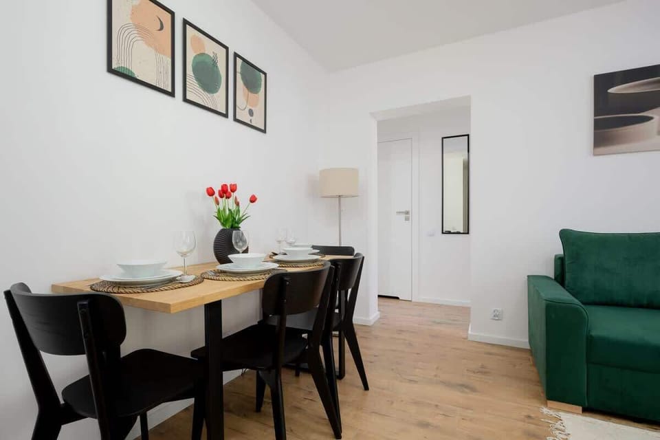 Large table with chairs for eating communal meals. 