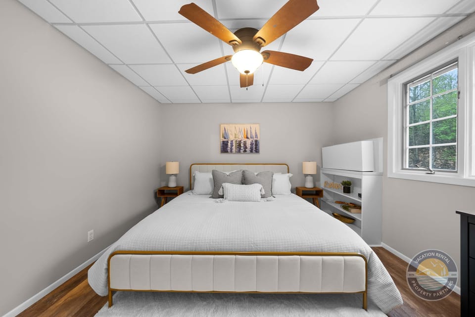 Comfortable bedroom with a clean, calming feel and plenty of storage space to unpack and settle in.