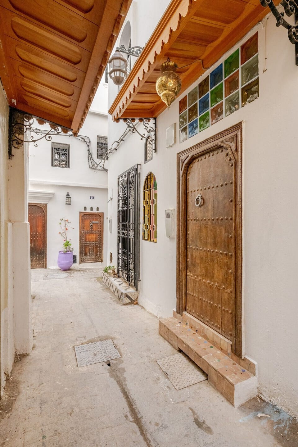 Immerse yourself in Moroccan style in this inviting living area. Relax on the colorful cushions or explore the intricate details of the traditional architecture.