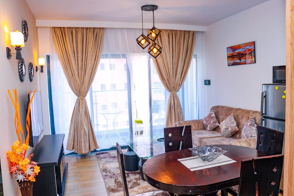 Classic Apartment | Living area | 55-inch Smart TV with cable channels, first-run movies