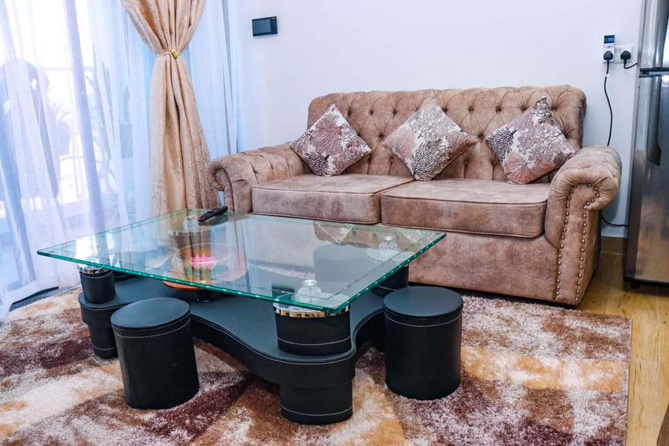 Classic Apartment | Living area | 55-inch Smart TV with cable channels, first-run movies