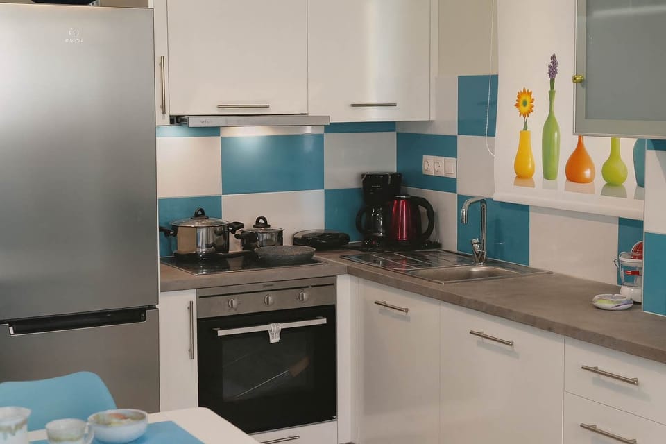 Embark on culinary adventures with the fully equipped kitchen