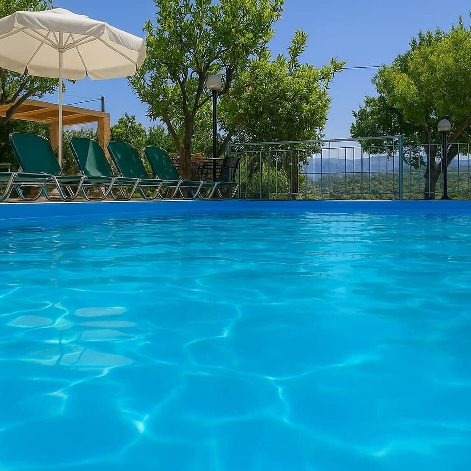 Unwind in the serene swimming pool, ideal for relaxation and rejuvenation