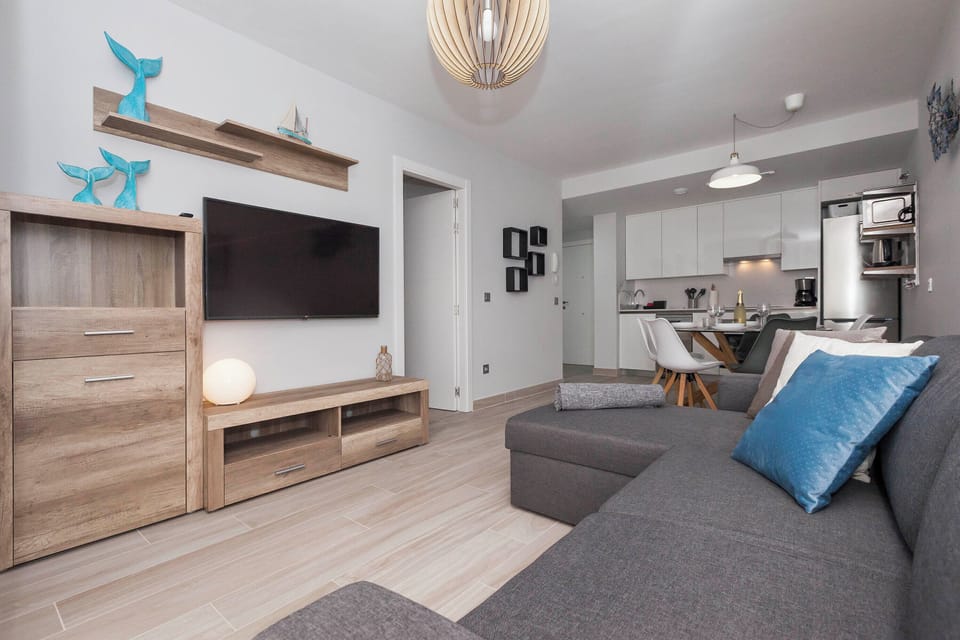 Apartment | Living area | 50-inch flat-screen TV with cable channels, TV