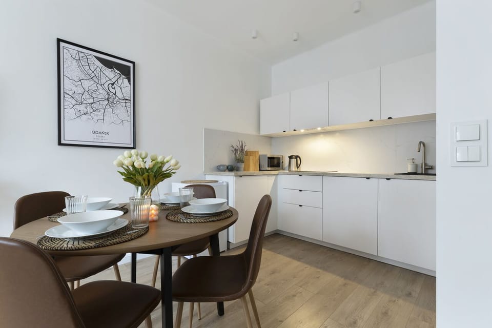 Classic Apartment, City View | Living area | Flat-screen TV
