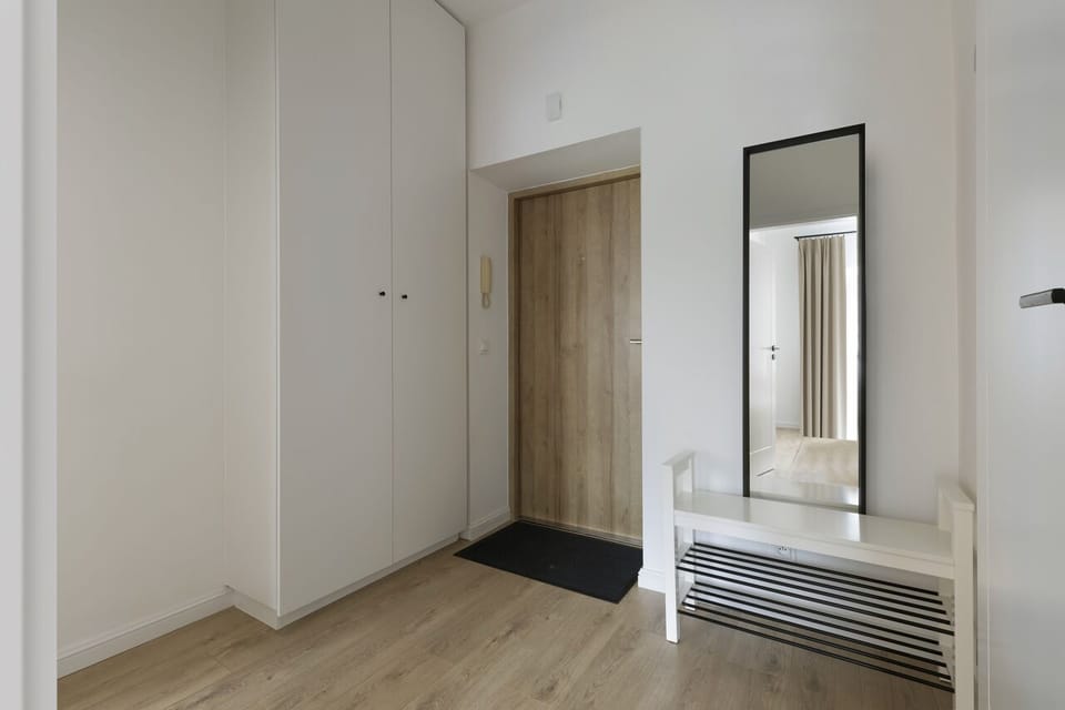 Classic Apartment, City View | Living area | Flat-screen TV