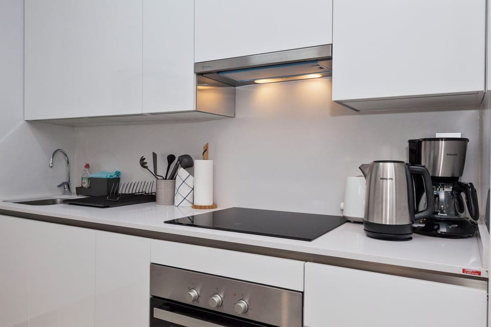 Comfort Apartment | Private kitchen | Full-size fridge, microwave, oven, stovetop