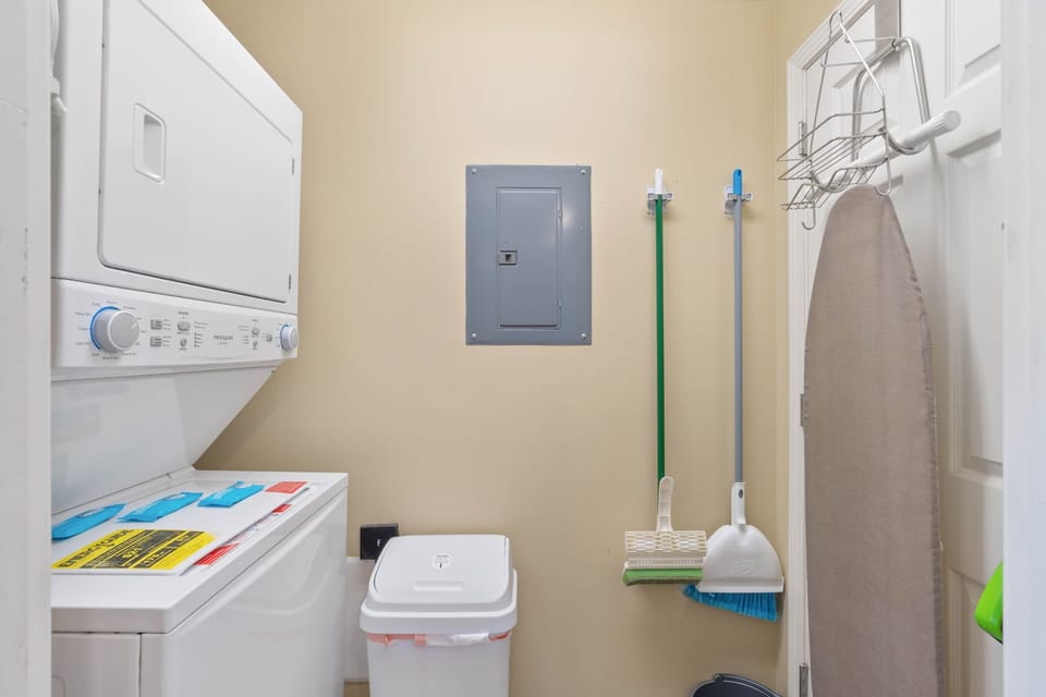In-unit free laundry by the kitchen closet space