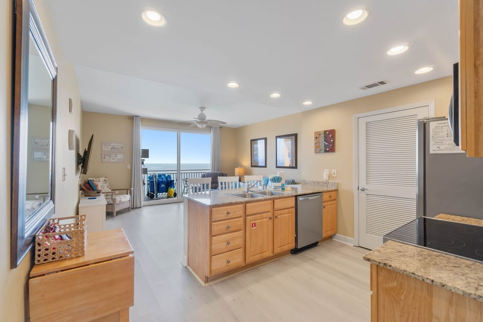 Open-concept space between the kitchen and living area