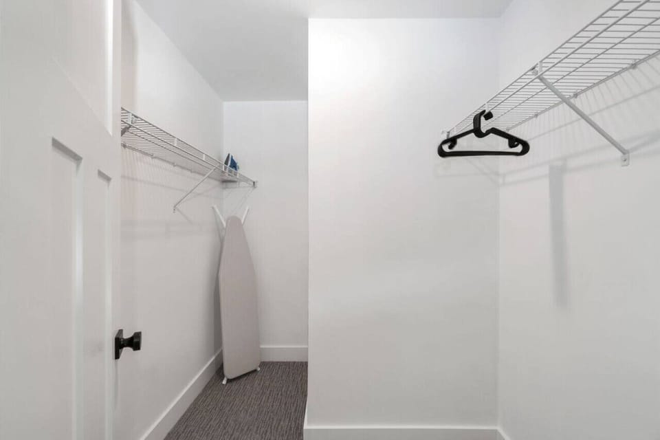 Master Closet offers Ample space to store your clothes for however long you are staying! Iron and ironing board are a great bonus!