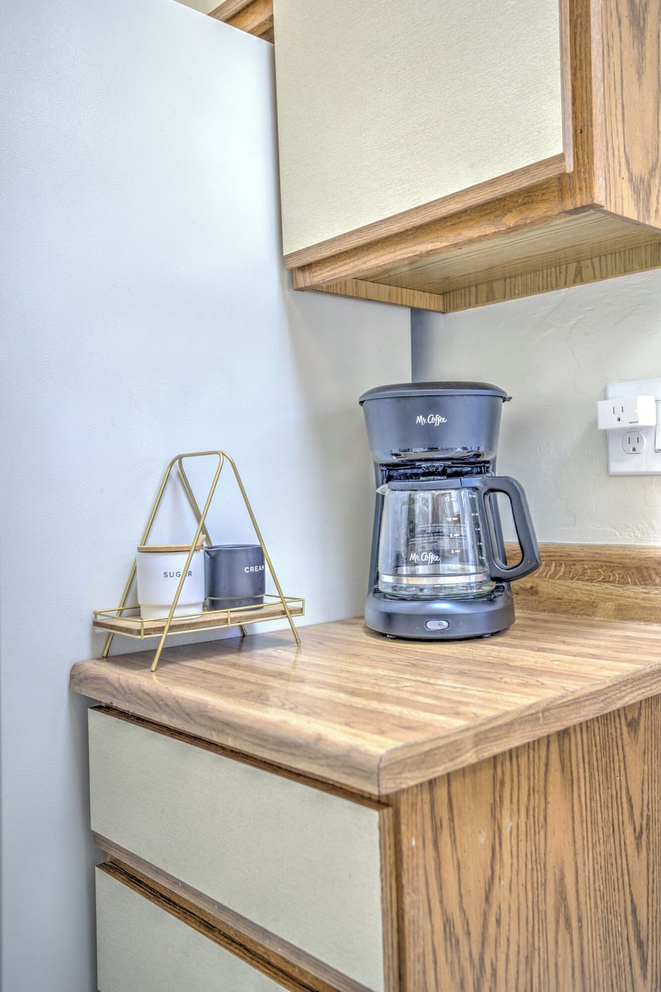 Kitchen with Coffee Maker, Cream and Sugar