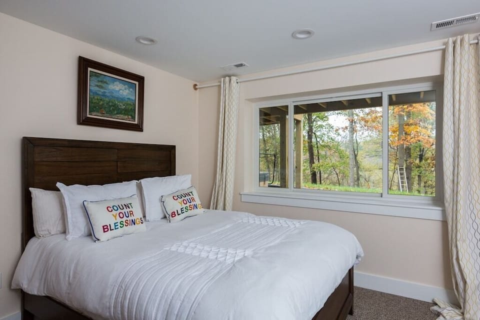 The basement queen bedroom