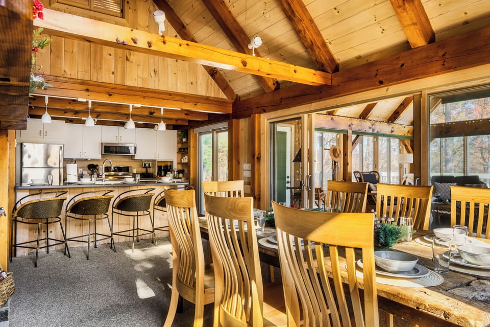Plenty of seating at the main dining table, breakfast bar and adjacent sunroom.