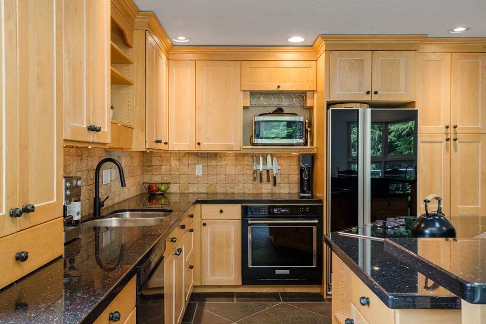 Whip up meals in style with spacious countertops and modern cookware.