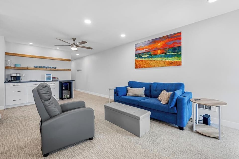 Living room offers a comfortable Queen sofa sleeper.