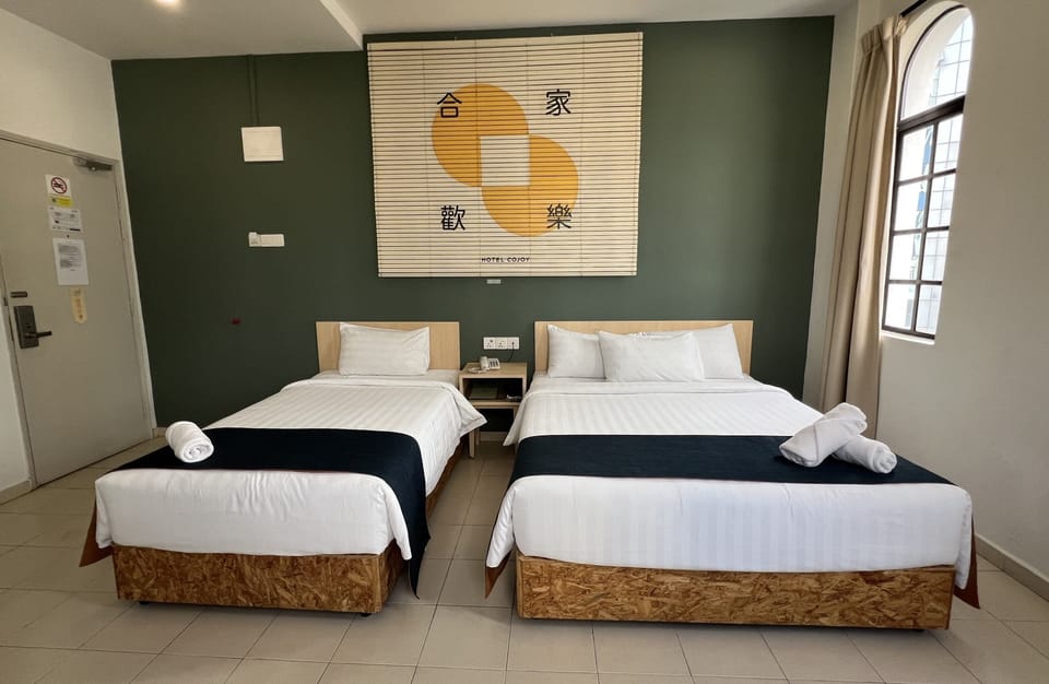 Deluxe Triple Room | Desk, laptop workspace, iron/ironing board (on request), WiFi (free)