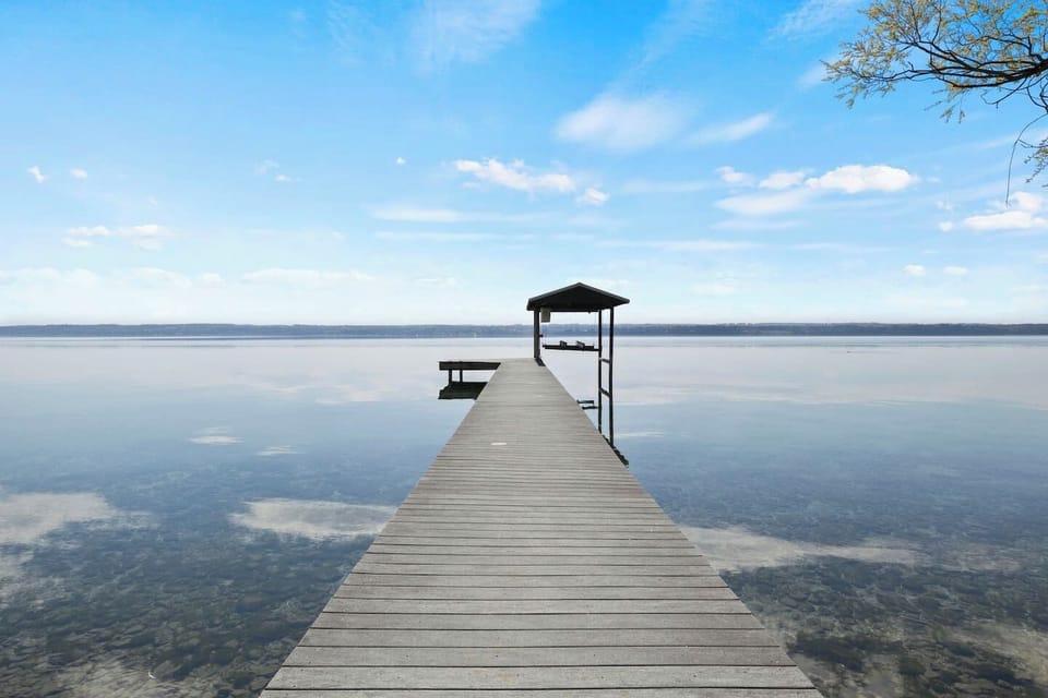 Lakefront / Boathouse / Dock (requires three flights of stairs to access) -  Stroll down our peaceful wooden pier extending into the crystal-clear waters of the lake, complete with a charming gazebo—ideal for serene lakeside moments.